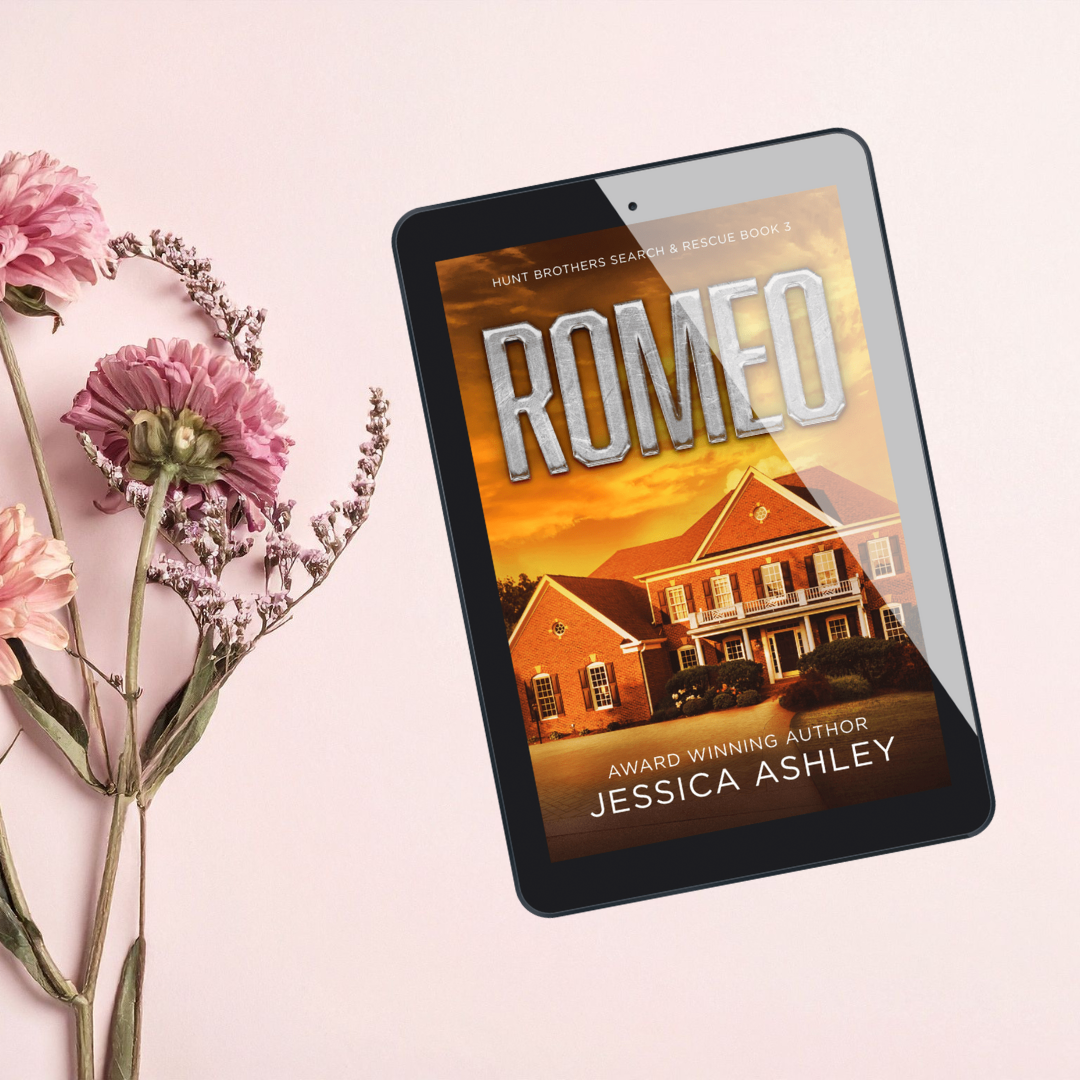 E-reader displaying the book cover of 'Romeo' by Jessica Ashley on a pink background with flowers.