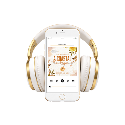 White and gold headphones with a smartphone displaying an audiobook cover on a white background
