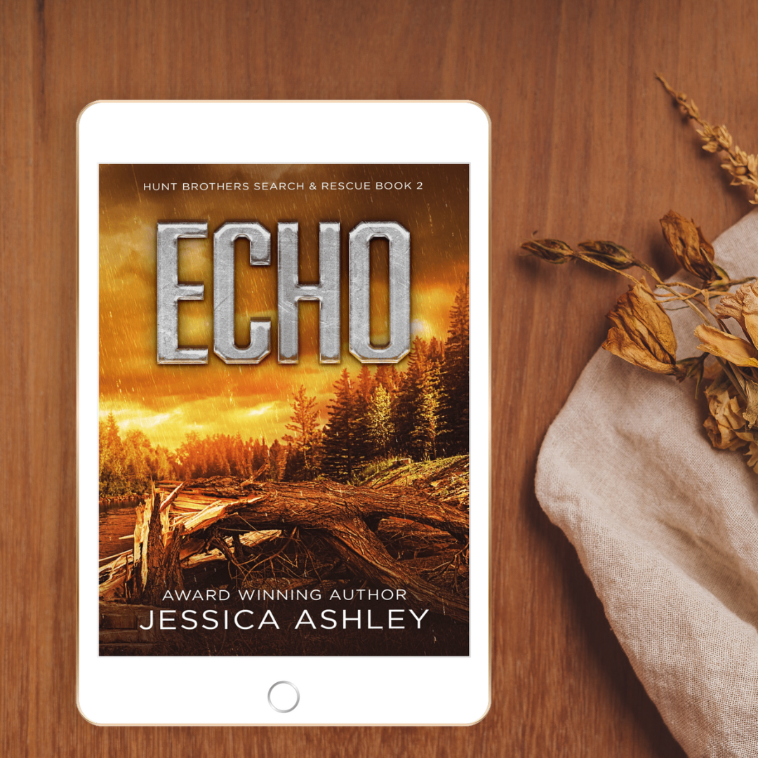 Tablet displaying the book cover of 'Echo' by Jessica Ashley on a wooden surface with dried flowers.