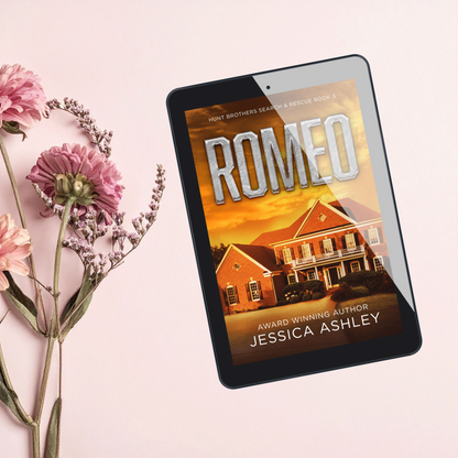 E-reader displaying the book cover of 'Romeo' by Jessica Ashley on a pink background with flowers.
